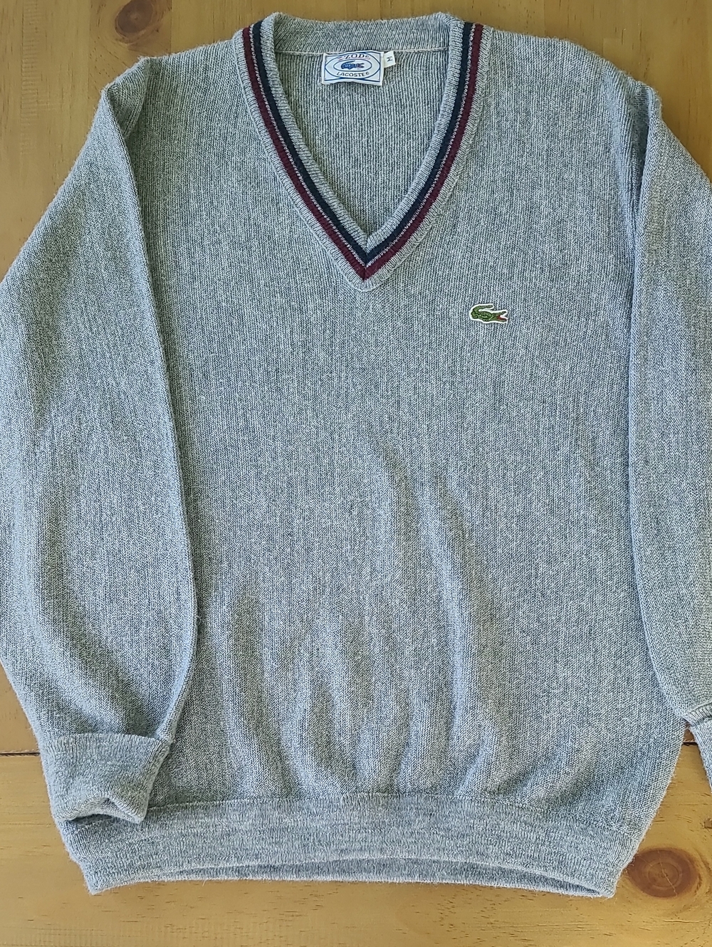 Vintage Lacoste Men's Wool V-Neck Sweater in Light Gray with Stripe Trim. Medium